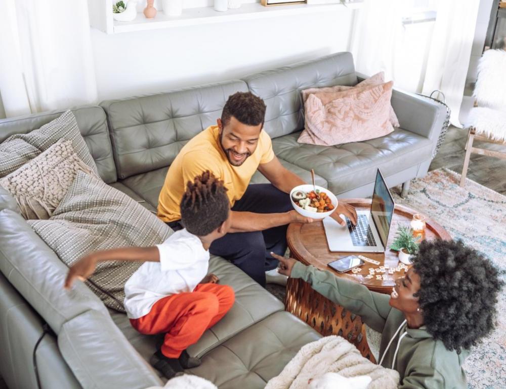 Happy Family sitting on a couch